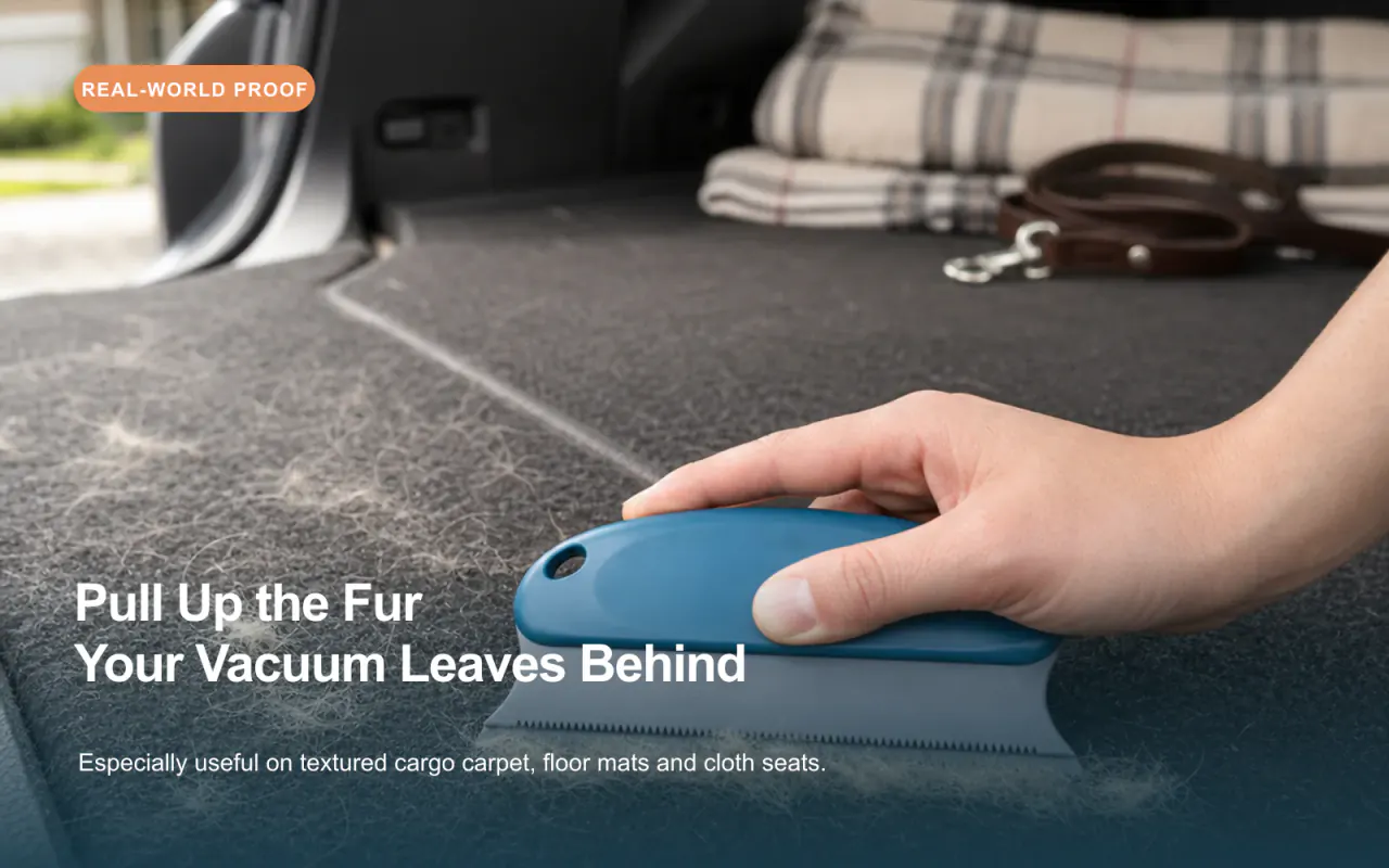 Dark blue pet hair remover brush gathering fur from a car seat